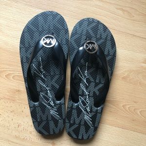 Michael Kors flip flops. Size 6.